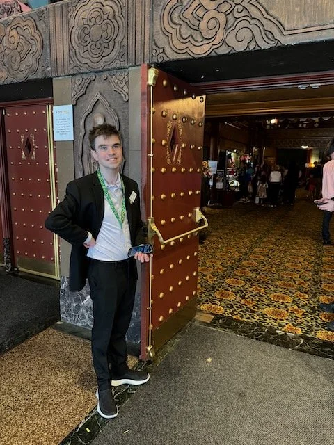 Neurodivergent volunteer usher